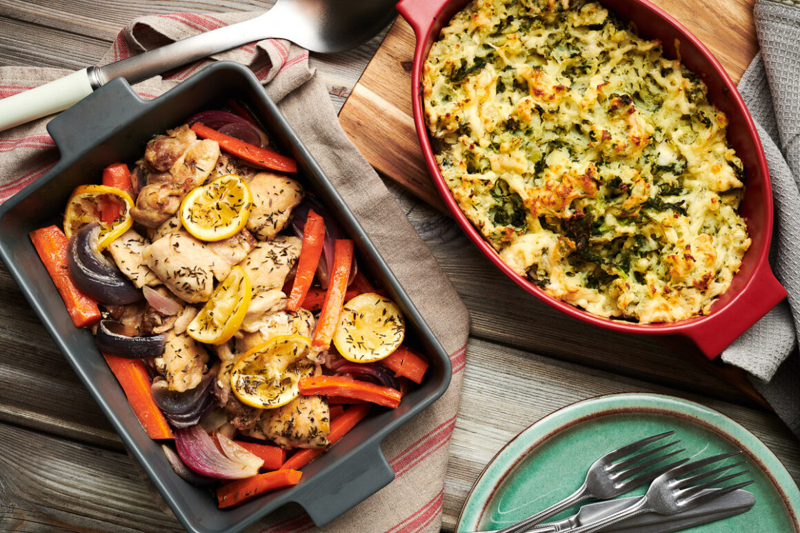 a top down shot of a tray of lemon chicken with veg and a side of colcannon. shot by professional food photographer for coeliac uk in connection with delicious by design