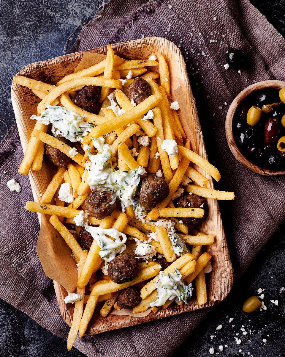 top down photo of loaded fries with meatballs